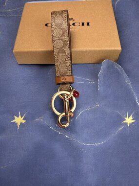 🌸Coach Brown Key Holder with Gold and Red Accents